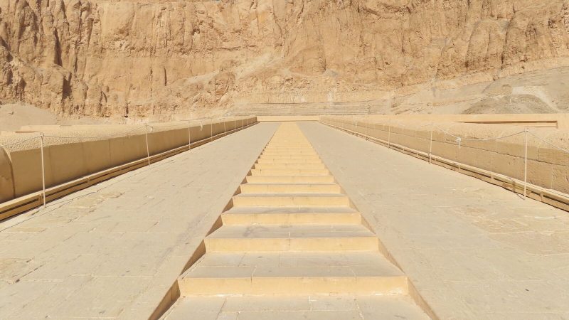 Stone steps at Hatshepsut Temple in Luxor, revealing ancient Egyptian architecture.