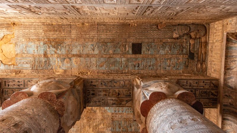 Explore the detailed hieroglyphs and grand columns of Dendera Temple, showcasing ancient Egyptian artistry.