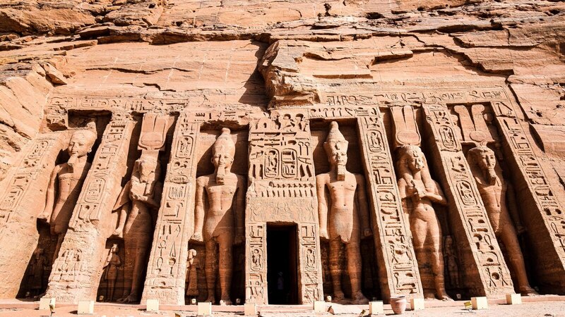 Explore the magnificent carvings at the entrance of the ancient Egyptian temple in Abu Simbel.