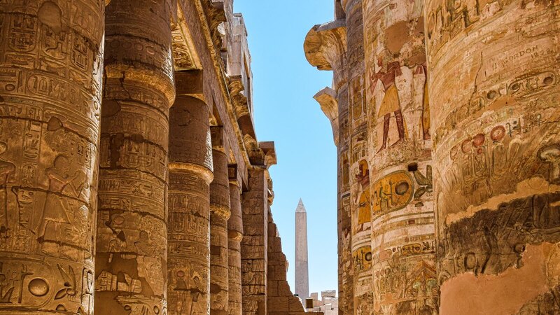 Explore the majestic columns and hieroglyphs at Karnak Temple in Egypt.