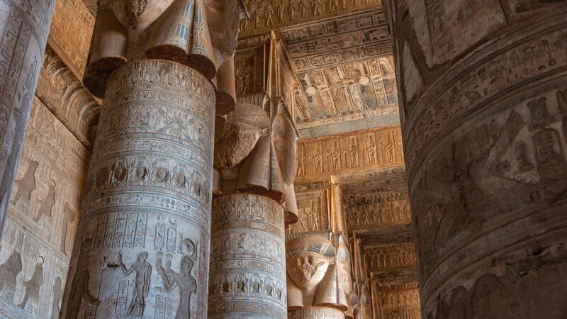 Explore the rich history of Dendera Temple adorned with detailed Egyptian hieroglyphs.