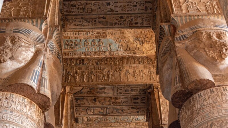 Detailed view of hieroglyphs and columns in the ancient Dendera Temple in Egypt.