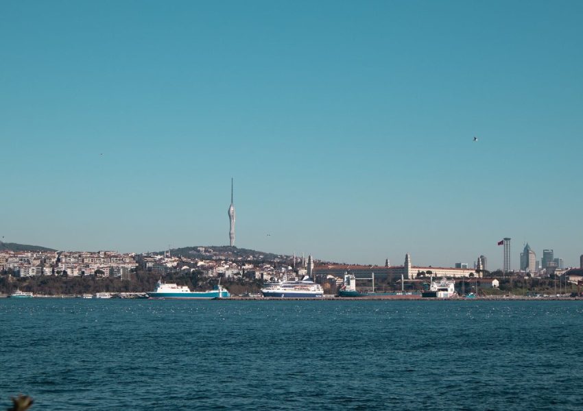A stunning daytime view of İstanbul's Bosphorus and skyline, featuring the Çamlıca Tower.